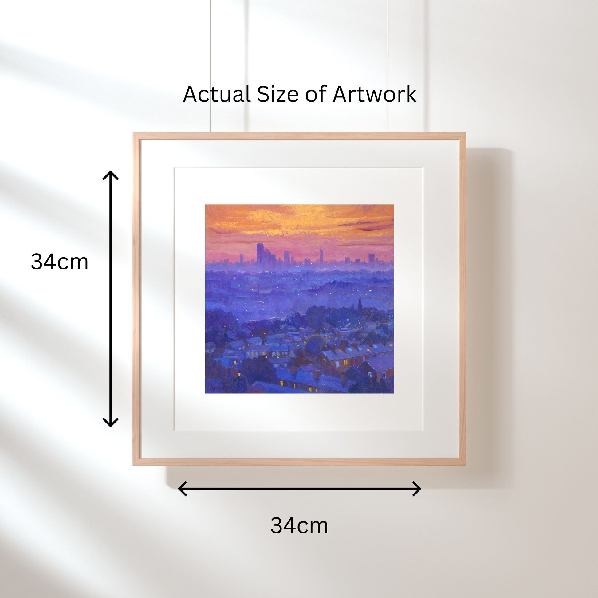 skyline sunset 34cm print displayed in a frame hanging on the wall