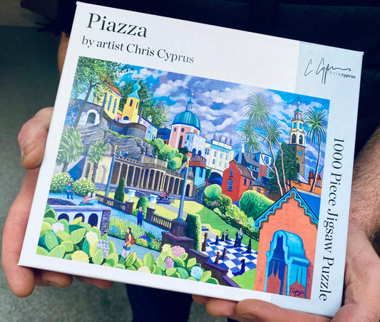 1000 piece Jigsaw Puzzle by famous artist Chris Cyprus features a scene of the world famous village Portmeirion in Wales. The jigsaw is supplied in a fully recycled box and can be passed on for others to enjoy
