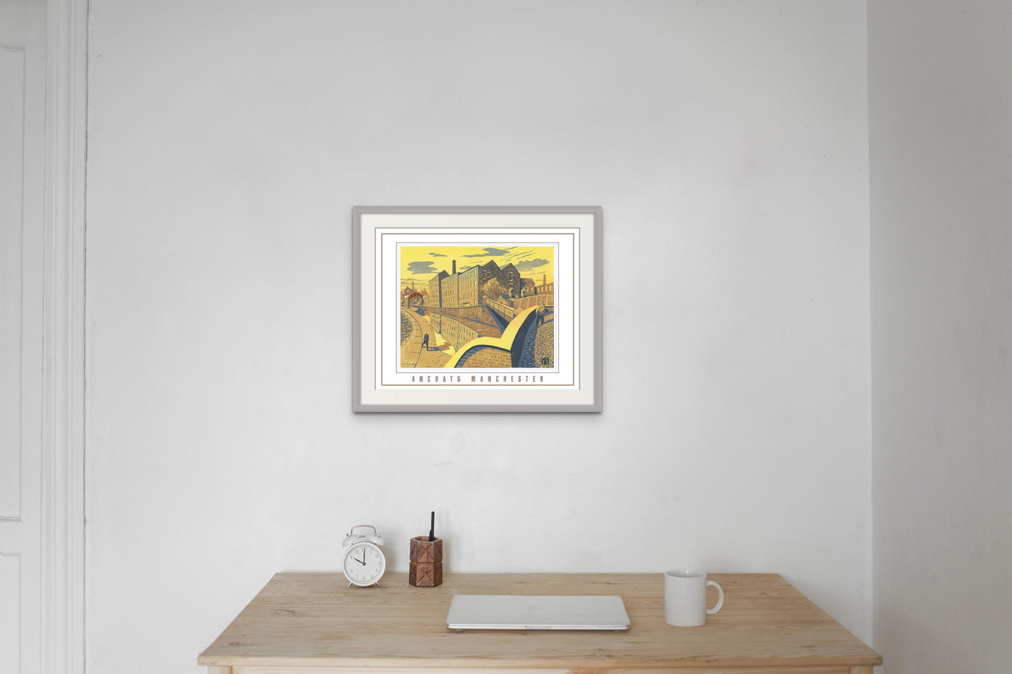 Special Edition Poster Print of a scene featuring Ancoats, Manchester by famous artist Chris Cyprus. The image shows the poster in a frame hung on the wall. Size of Poster is A2. Supplied tube rolled for worldwide shipping