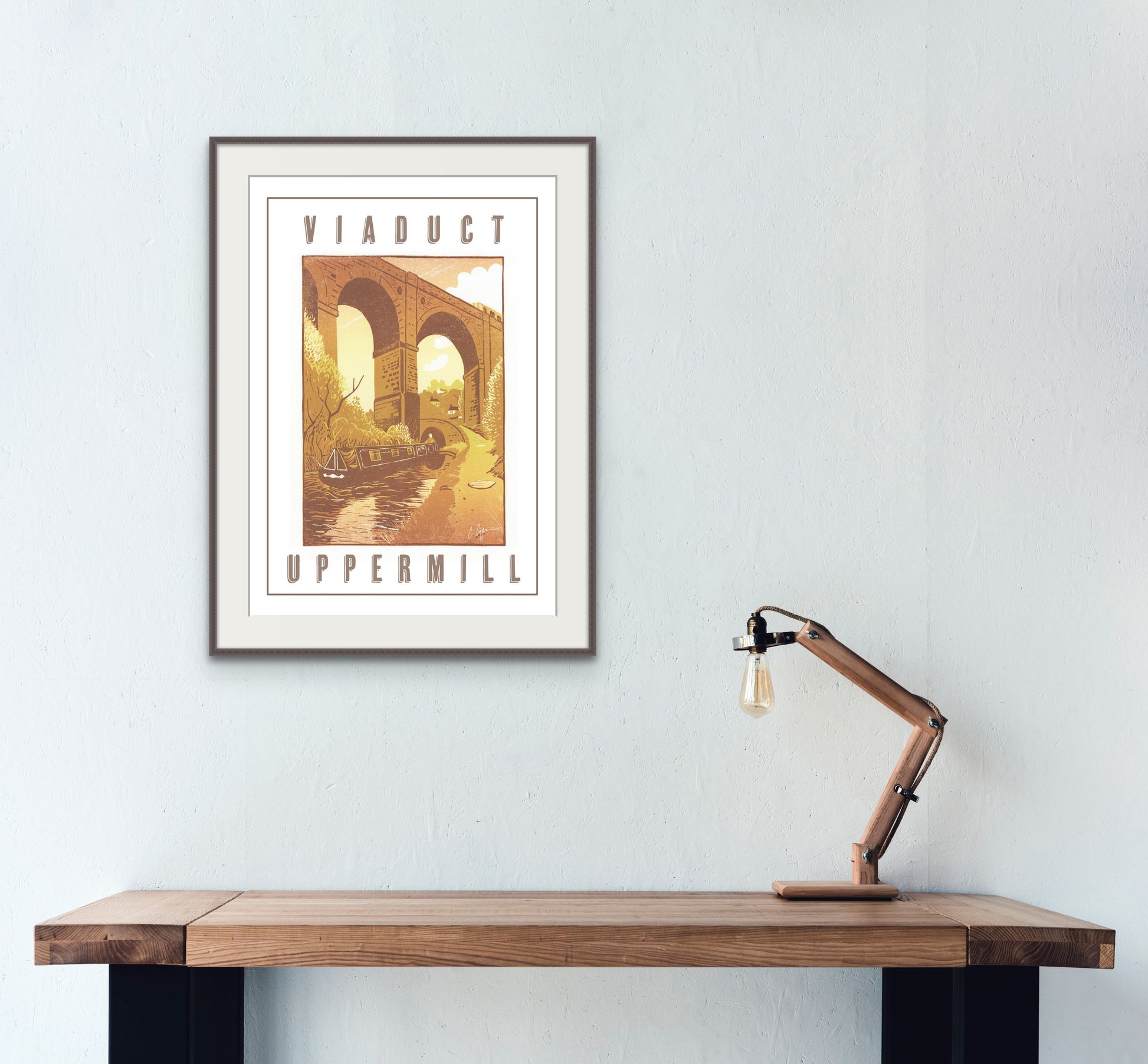 A beautiful reproduction Poster Print featuring a linocut of the viaduct over the canal at Uppermill, Oldham          A2 size         Printed on 250gsm silk board paper - sustainably sourced         Tube rolled ideal for worldwide shipping. The image shows the poster framed and displayed